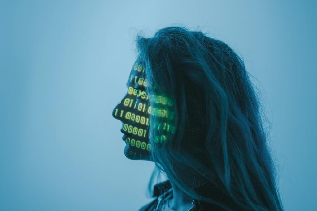 Property management professional working alongside AI-powered tools to manage resident communications